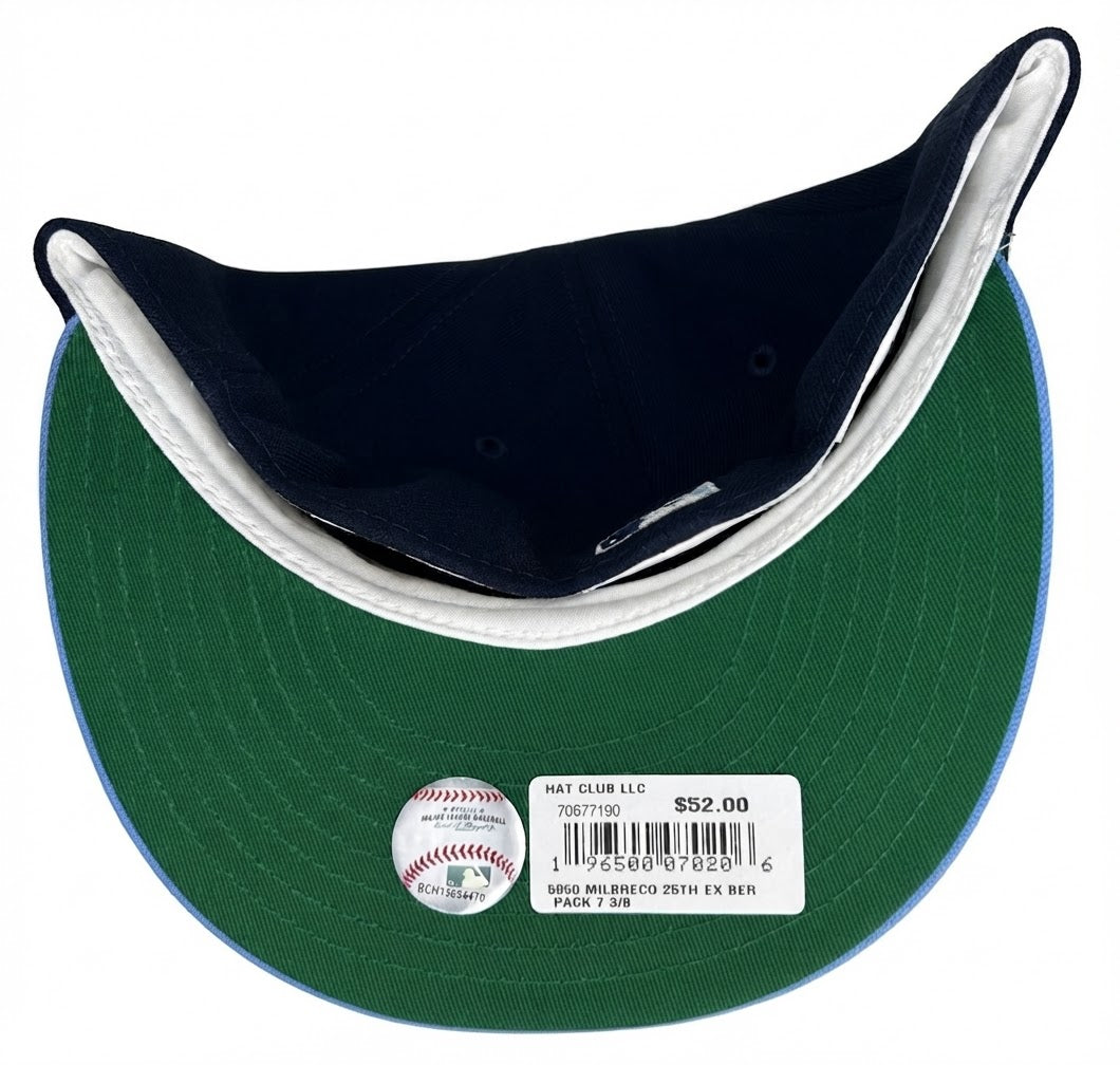 HC Exclusive Beer Pack Milwaukee Brewers 25th Anniversary Patch 59Fifty Fitted Hat in navy and light blue with an embroidered interlocking "M" logo on the front.
