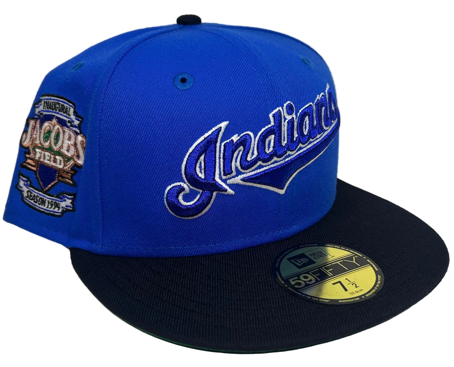 New Era 59FIFTY fitted Hat featuring a  Cleveland Indians, royal blue crown, a navy blue visor, a green undervisor, and an Inaugural Season 1994 Jacobs Field side patch for the Cleveland Indians.