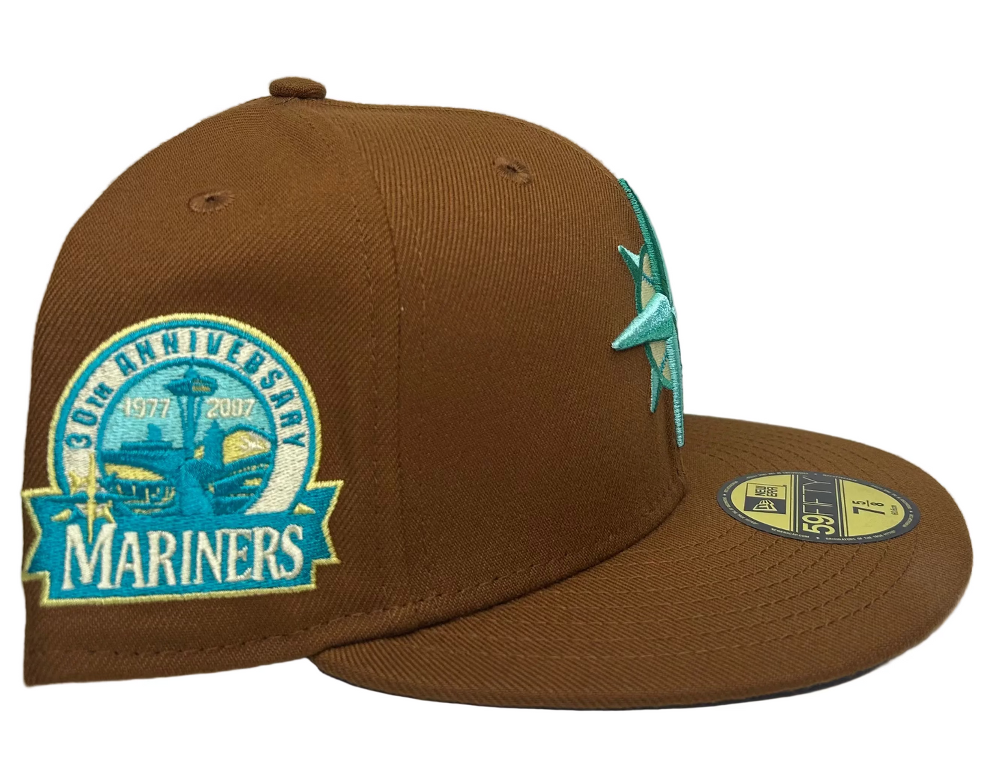 New Era 59FIFTY Seattle Mariners fitted hat featuring a vibrant teal compass logo on the front and a 30th-anniversary side patch.