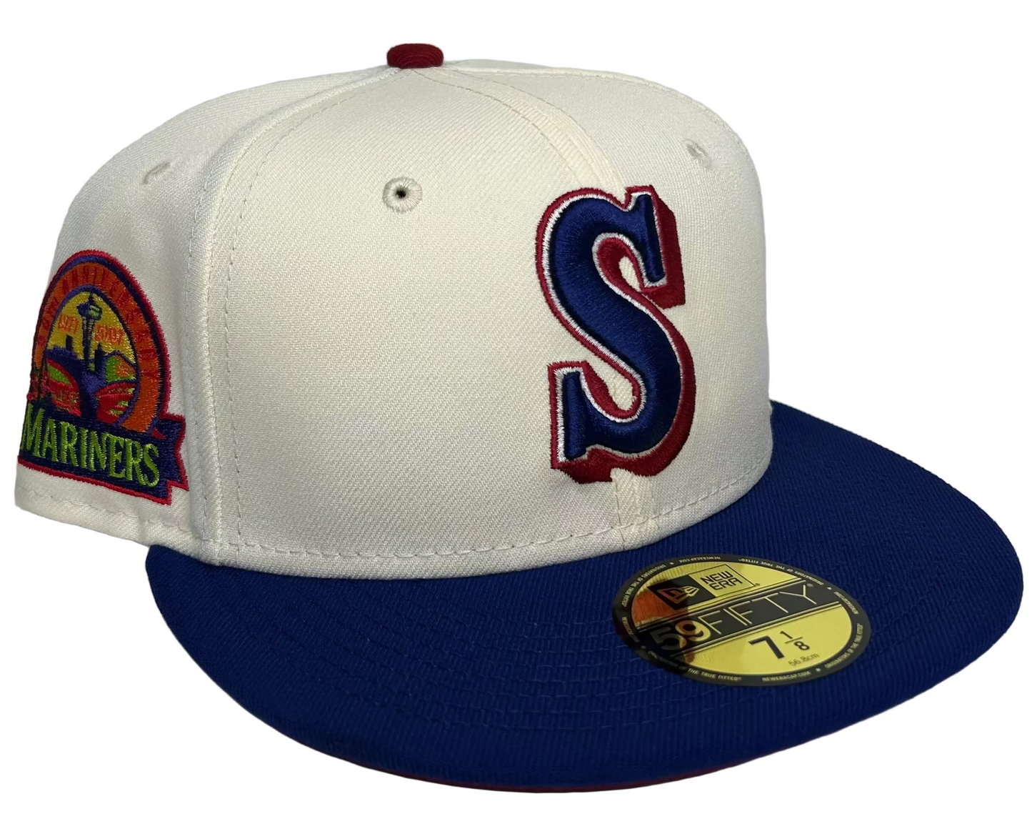 New Era 59FIFTY Seattle Mariners 30th Anniversary fitted hat with an off-white crown, royal blue brim, and a retro "S" logo.