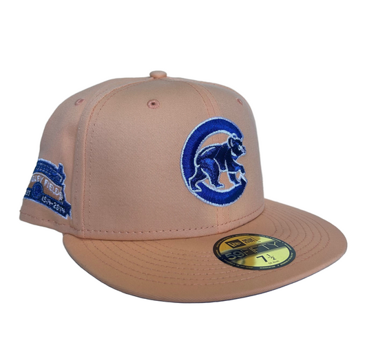 New Era Chicago Cubs 59FIFTY fitted hat in a peach/tan color with a side patch commemorating "100 Years at Wrigley Field 1914-2014”