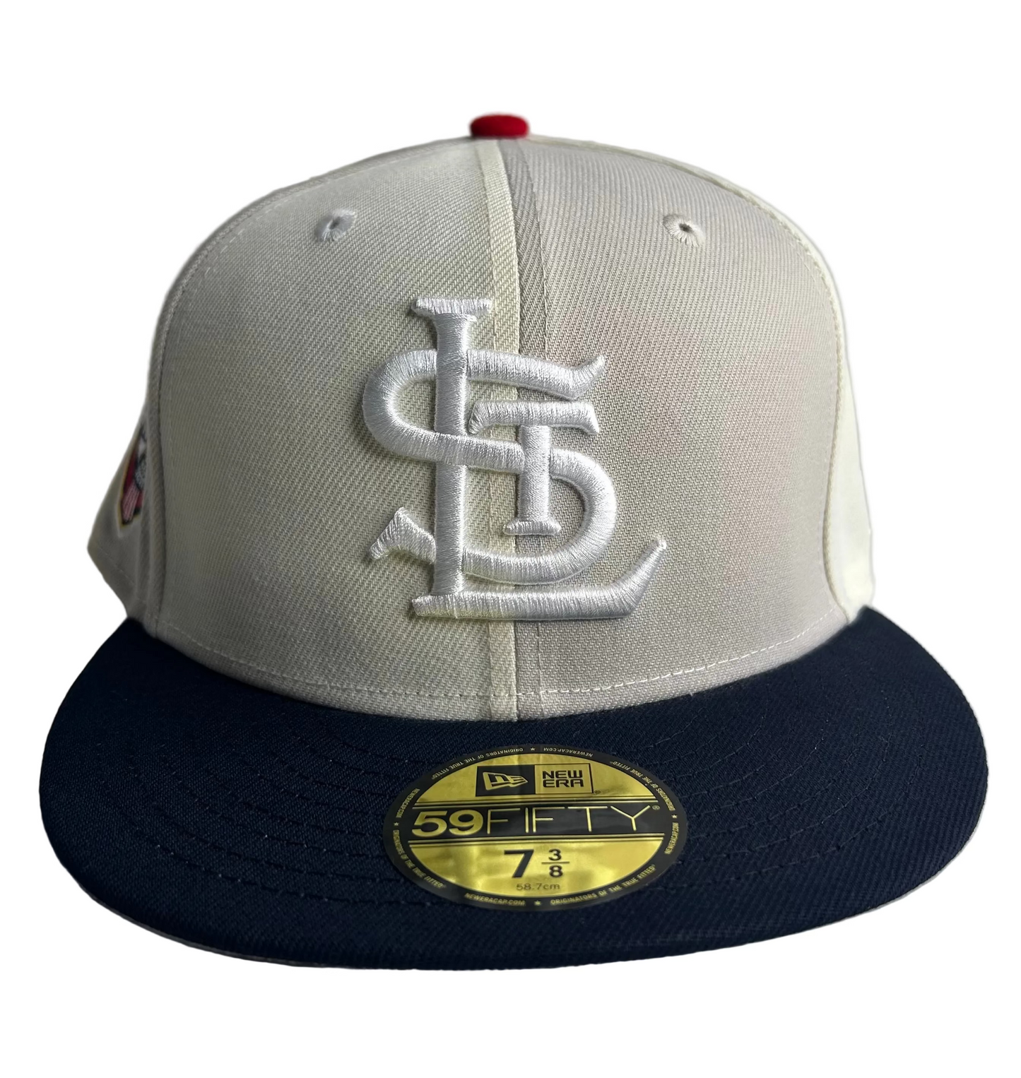 New Era St. Louis Cardinals 59Fifty fitted hat, featuring a chrome white crown, Navy visor, Gray UV & 1944 World Series side patch. 