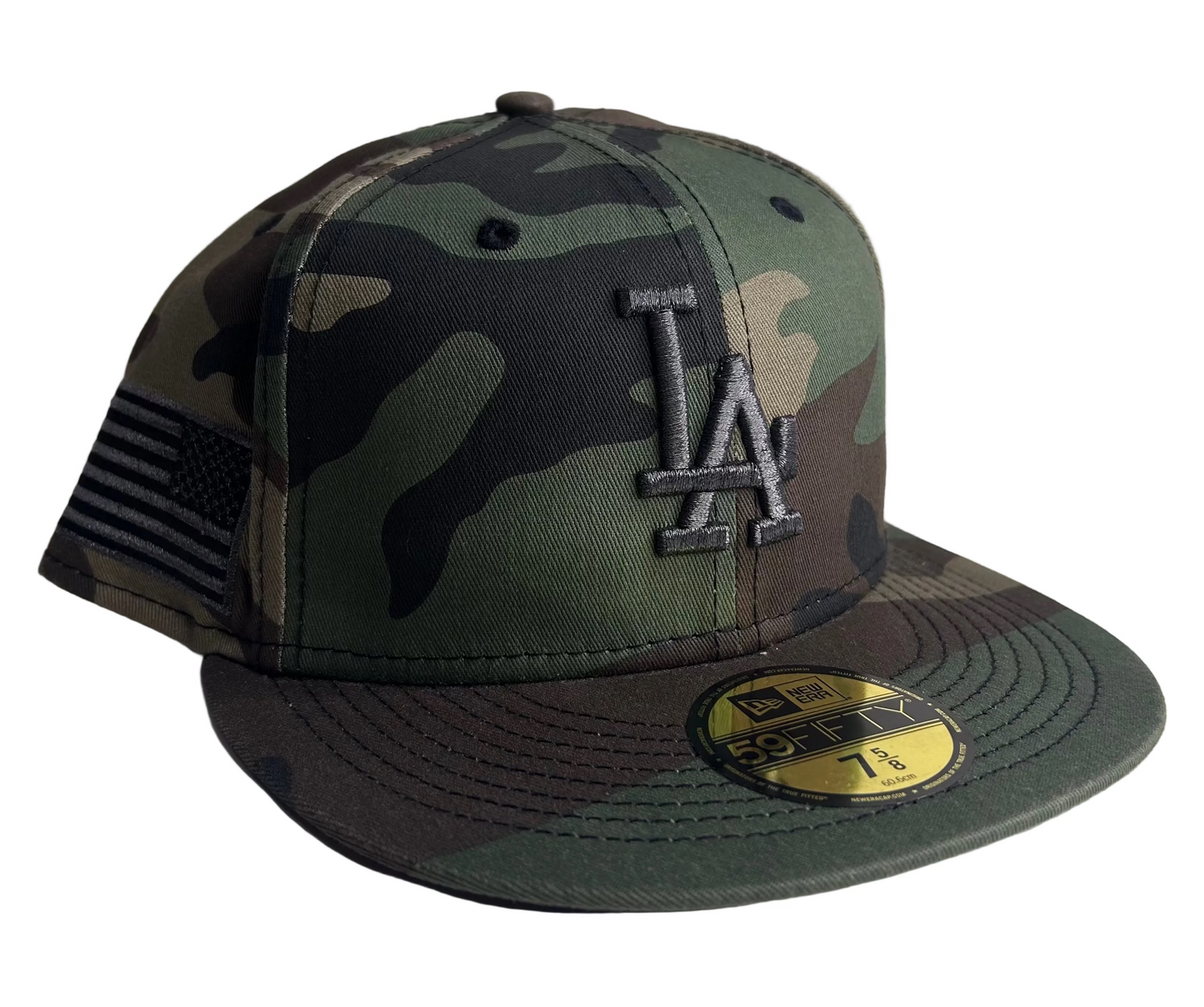 New Era 59FIFTY Los Angeles Dodgers fitted hat in a woodland camouflage pattern W/ side patch.