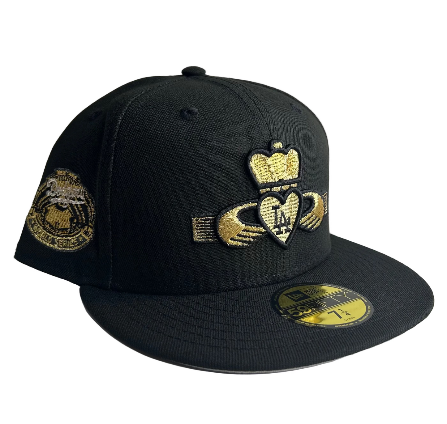 New Era 59FIFTY Los Angeles Dodgers “Kings” fitted hat with a Claddagh symbol and gold accents.