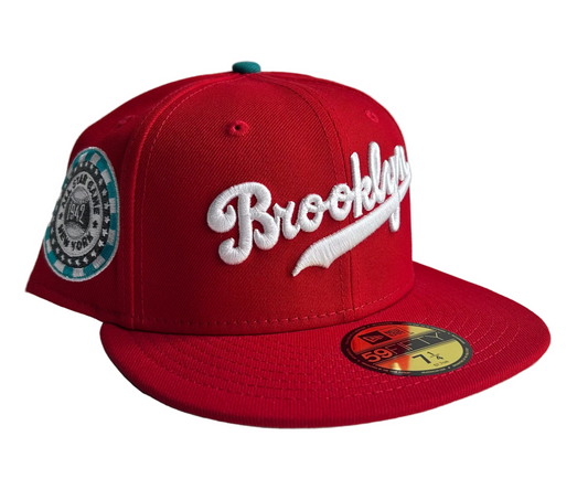 New Era 59Fifty fitted hat in Scarlet Red w/ Gray undervisor, featuring the "Brooklyn" script logo on the front and a 1942 All-Star Game side patch.