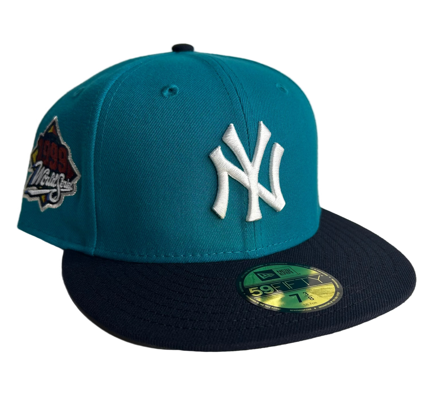 New Era 59FIFTY New York Yankees 1999 World Series fitted hat in a Teal 2-Tone Navy W/ Gray UV colorway. 