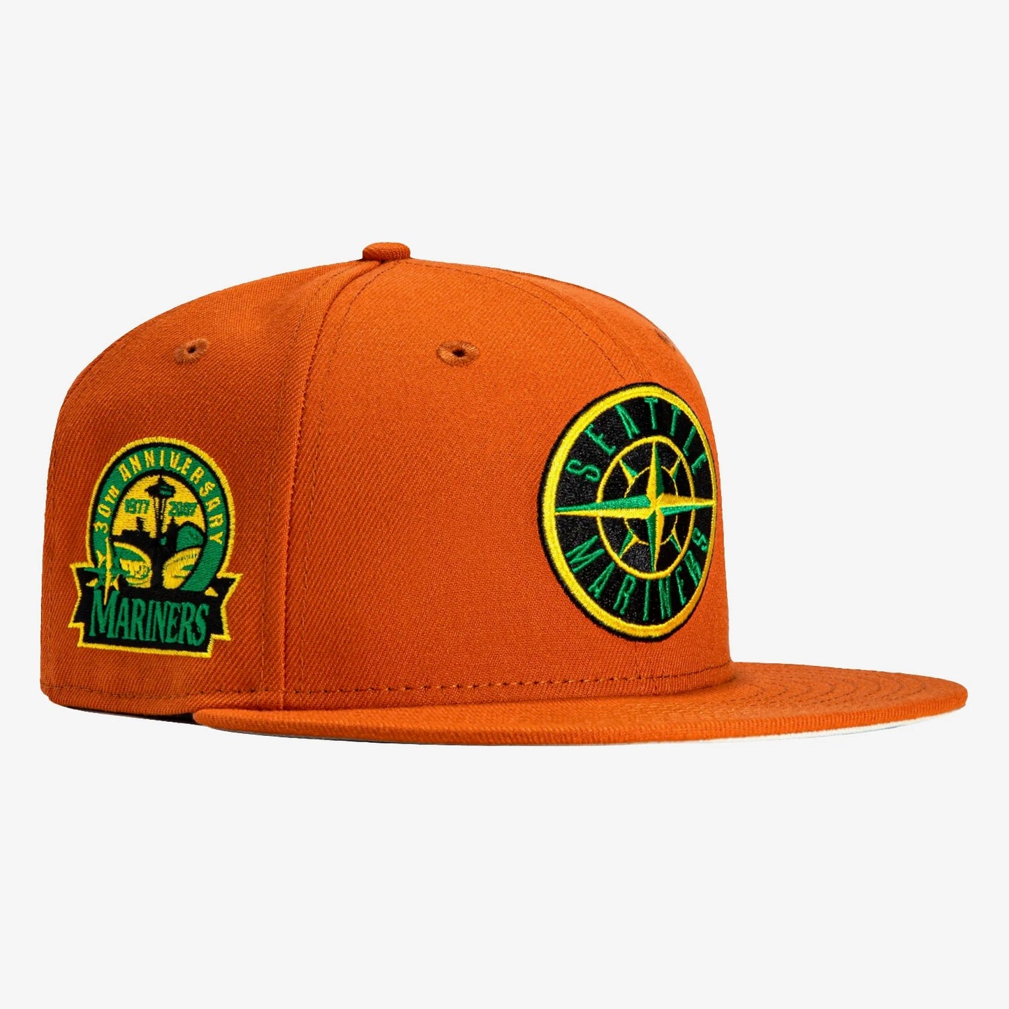 New Era 59FIFTY Seattle Mariners 30th Anniversary Patch fitted hat in burnt orange with a stone undervisor. 