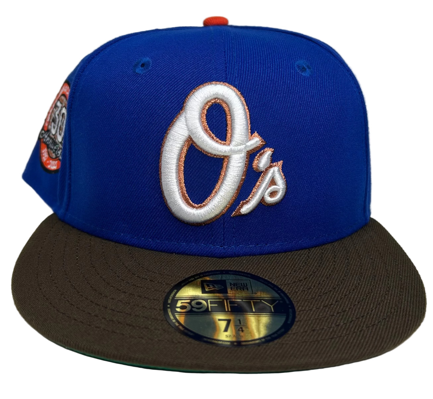 New Era Baltimore Orioles 2-Tone Royal Blue & Brown W/ Green UV 59FIFTY fitted hat featuring a 30th Anniversary side patch commemorating Camden Yards. 