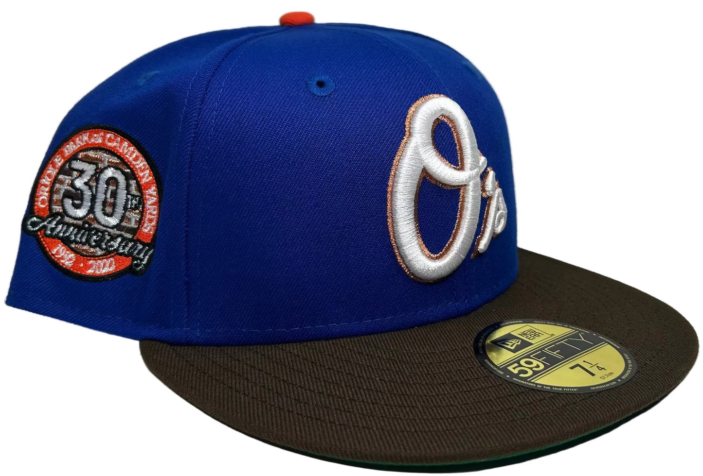 New Era Baltimore Orioles 2-Tone Royal Blue & Brown W/ Green UV 59FIFTY fitted hat featuring a 30th Anniversary side patch commemorating Camden Yards. 