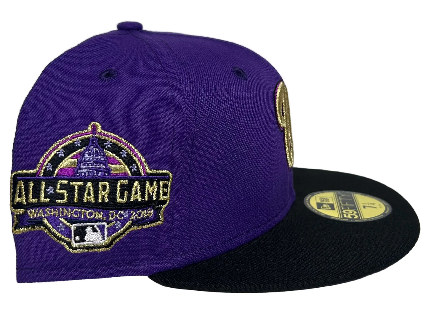 New Era Washington Nationals “Crown Royal” 10th Anniversary 59FIFTY Fitted Hat, featuring a purple crown, black visor, and gold embroidered logo. 