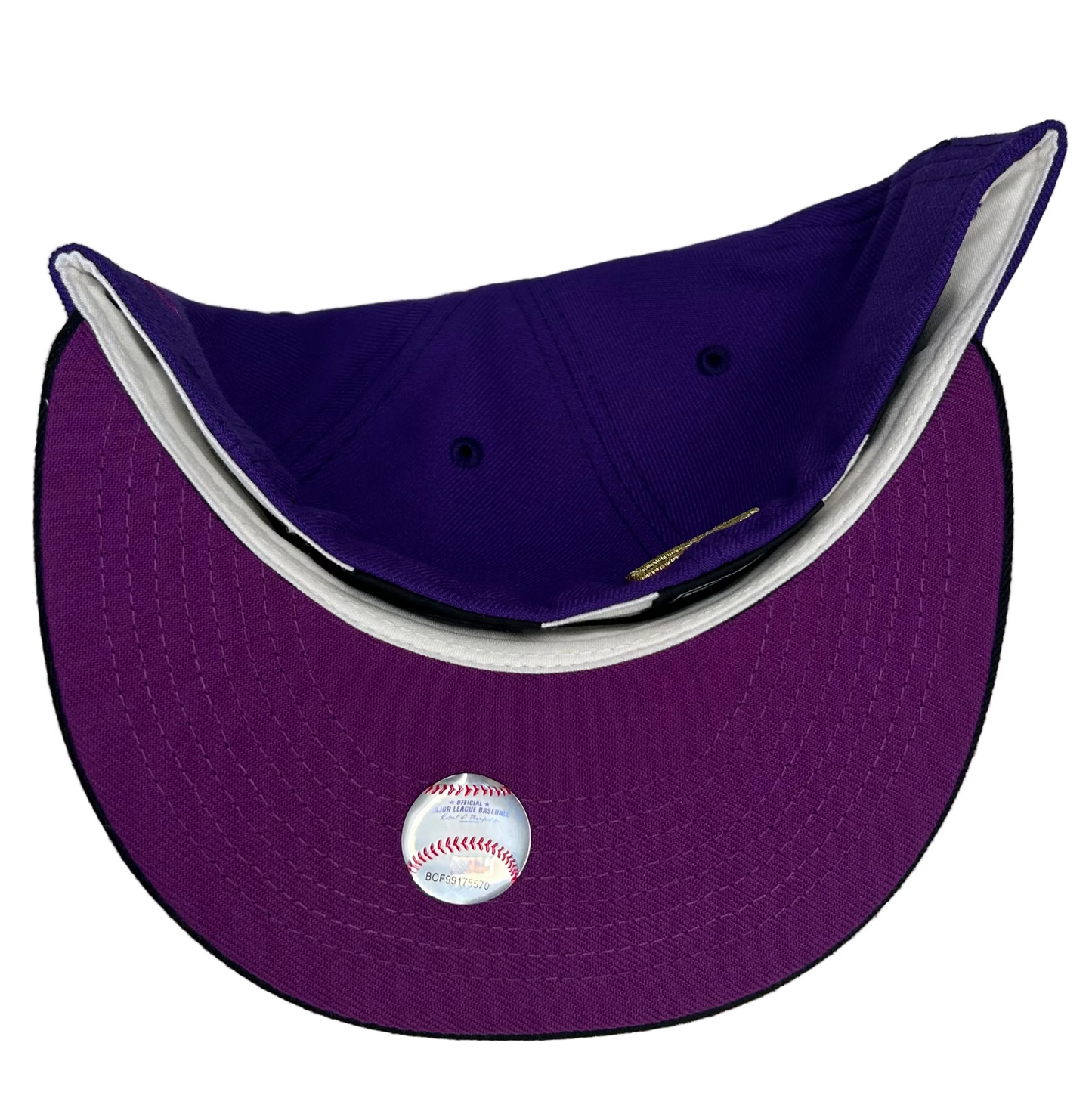 New Era Washington Nationals “Crown Royal” 10th Anniversary 59FIFTY Fitted Hat, featuring a purple crown, black visor, and gold embroidered logo. 