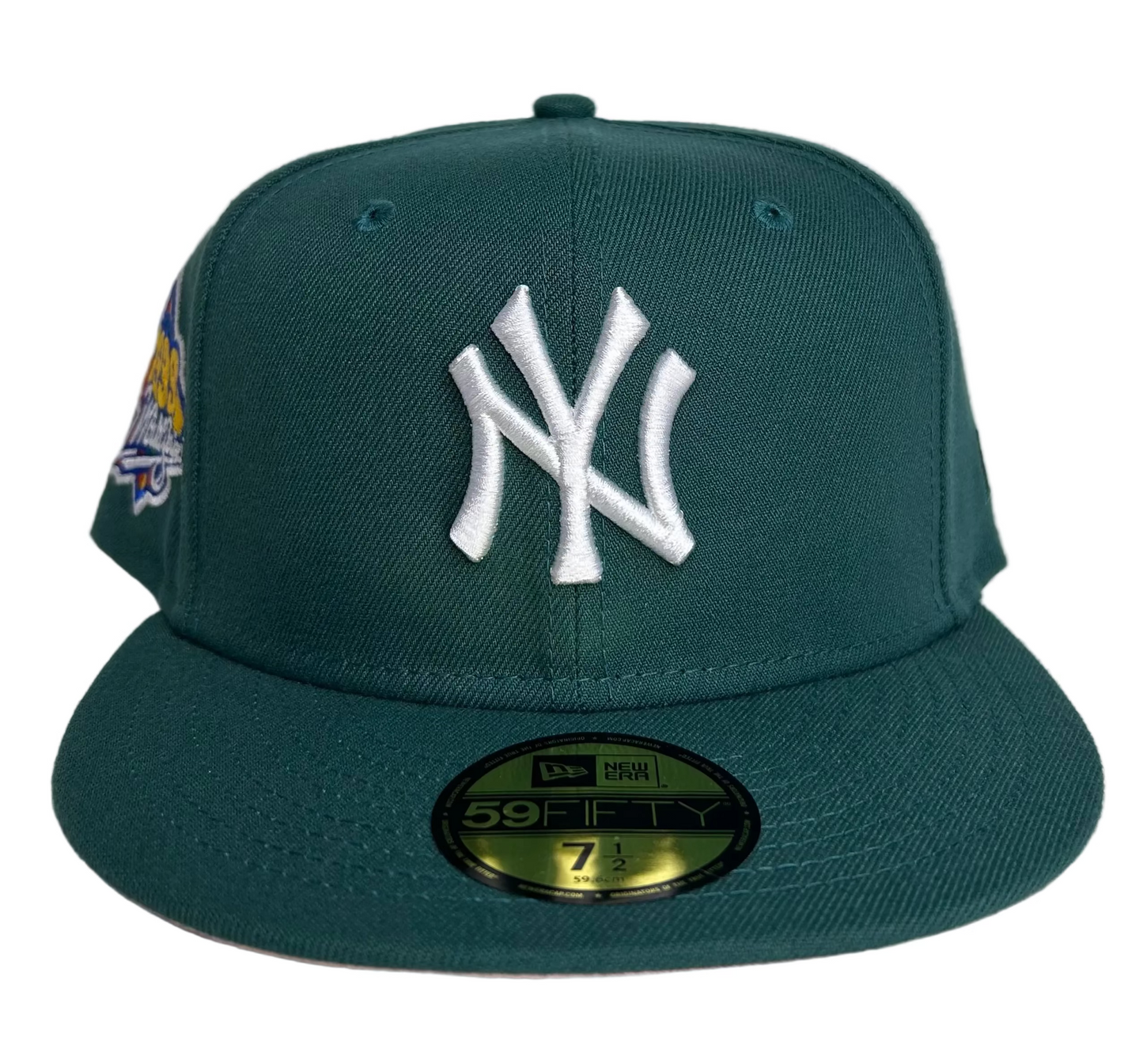 New Era New York Yankees 59FIFTY fitted hat featuring a 1999 World Series side patch and a teal green colorway W/ a pink UV.
