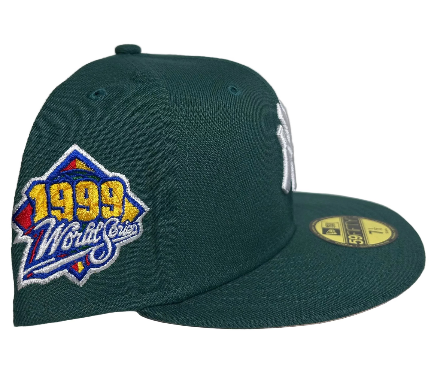 New Era New York Yankees 59FIFTY fitted hat featuring a 1999 World Series side patch and a teal green colorway W/ a pink UV.