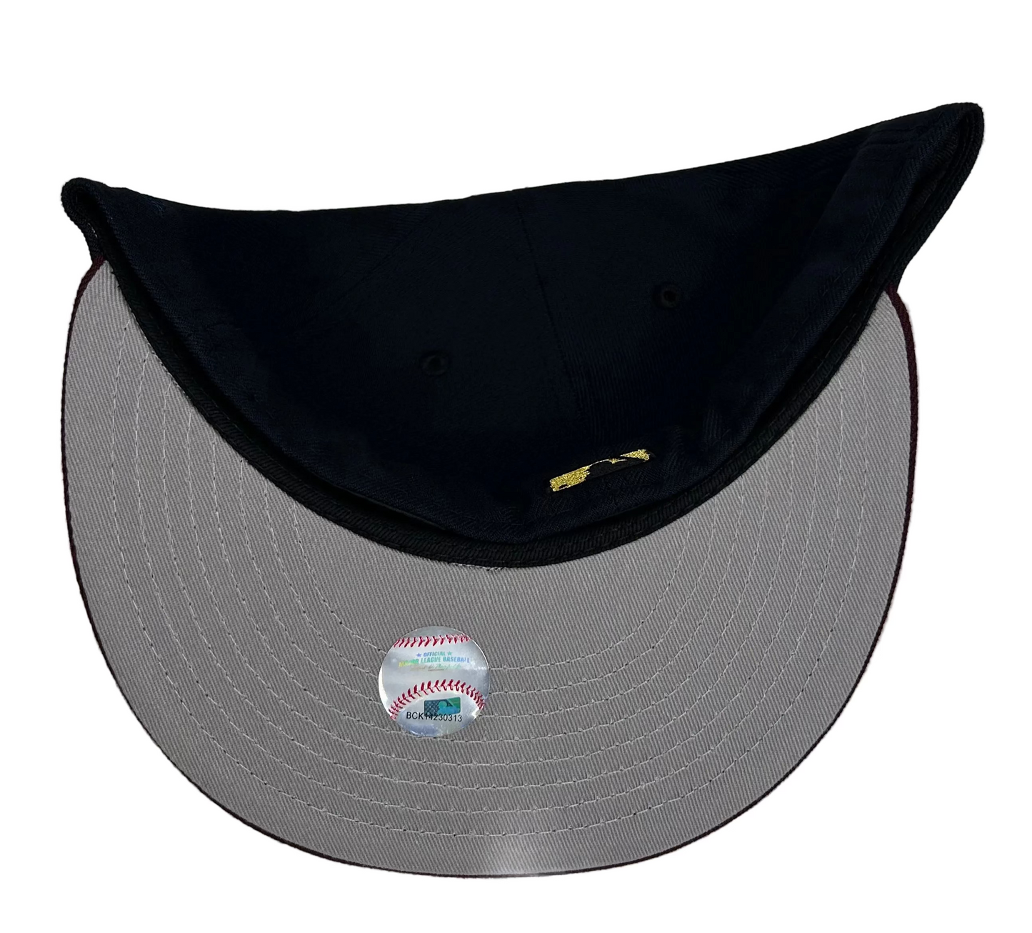 New Era 59FIFTY Los Angeles Dodgers featuring a maroon brim, a navy blue crown, and a side patch celebrating either a 40th anniversary at Dodger Stadium fitted Hat.