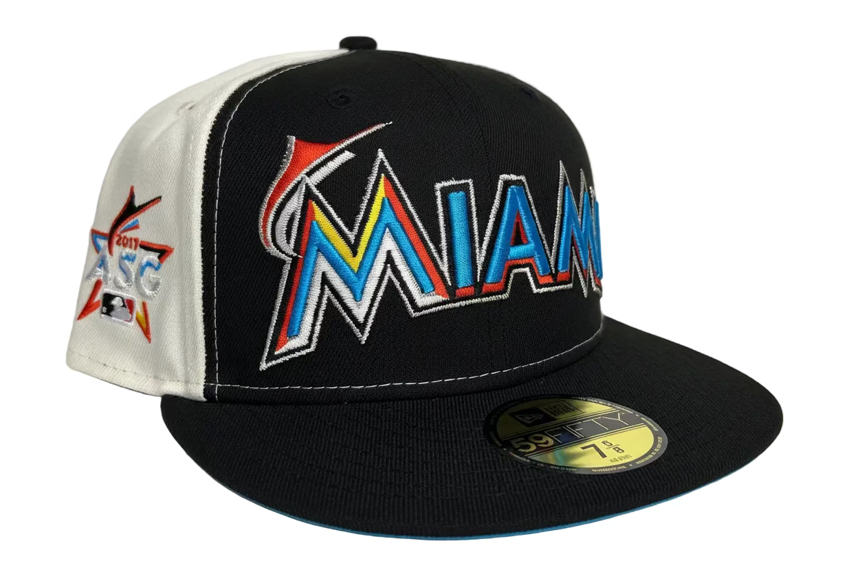 Miami Marlins New Era 59FIFTY Fitted Hat. It features the team's "MIAMI" wordmark logo in a vibrant multi-colored embroidery on the front.