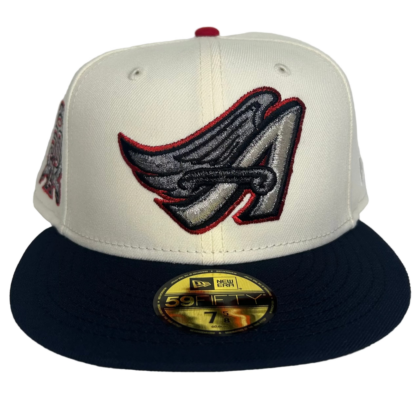 New Era Los Angeles Angels 59FIFTY fitted cap featuring a white "chrome" crown, a navy blue visor & commemorative side patch.