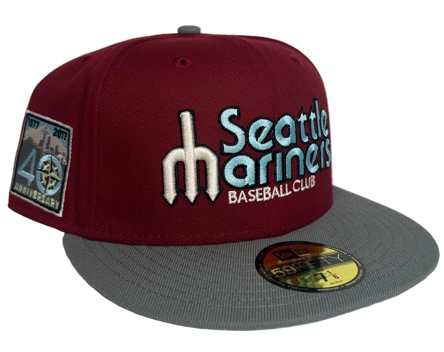 New Era 59FIFTY Seattle Mariners Baseball Club 40th Anniversary fitted hat featuring a burgundy/red lid, baby blue script lettering, & Icy Blue UV.