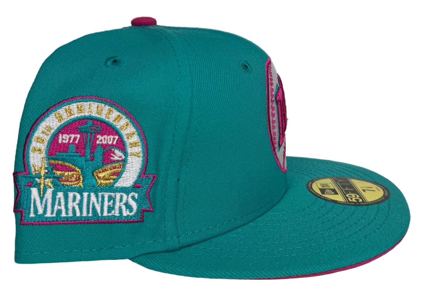Seattle Mariners New Era 59FIFTY fitted hat features a teal crown and visor W/ a Pink UV.