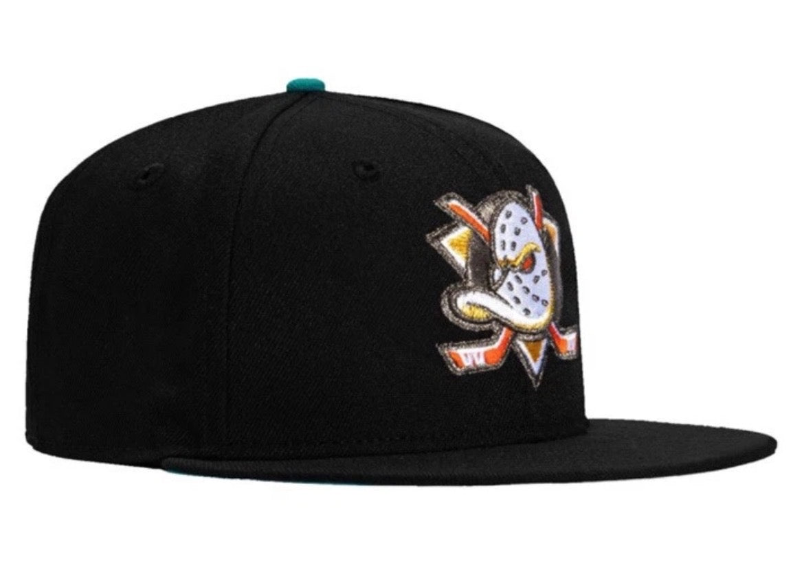 Anaheim Mighty Ducks W/ a teal UV HC Drop New Era 59Fifty fitted hat.