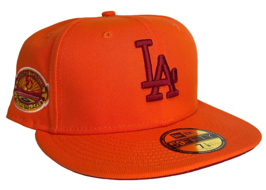New Era Los Angeles Dodgers HC 59FIFTY fitted hat featuring a bright orange color scheme and a special anniversary side patch. 