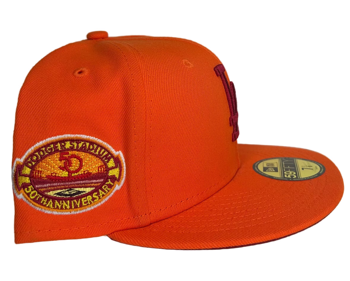 New Era Los Angeles Dodgers HC 59FIFTY fitted hat featuring a bright orange color scheme and a special anniversary side patch. 