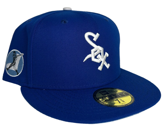 Chicago White Sox 59FIFTY fitted hat by New Era features a royal blue crown and visor, accented with a white embroidered "Sox" logo on the front.