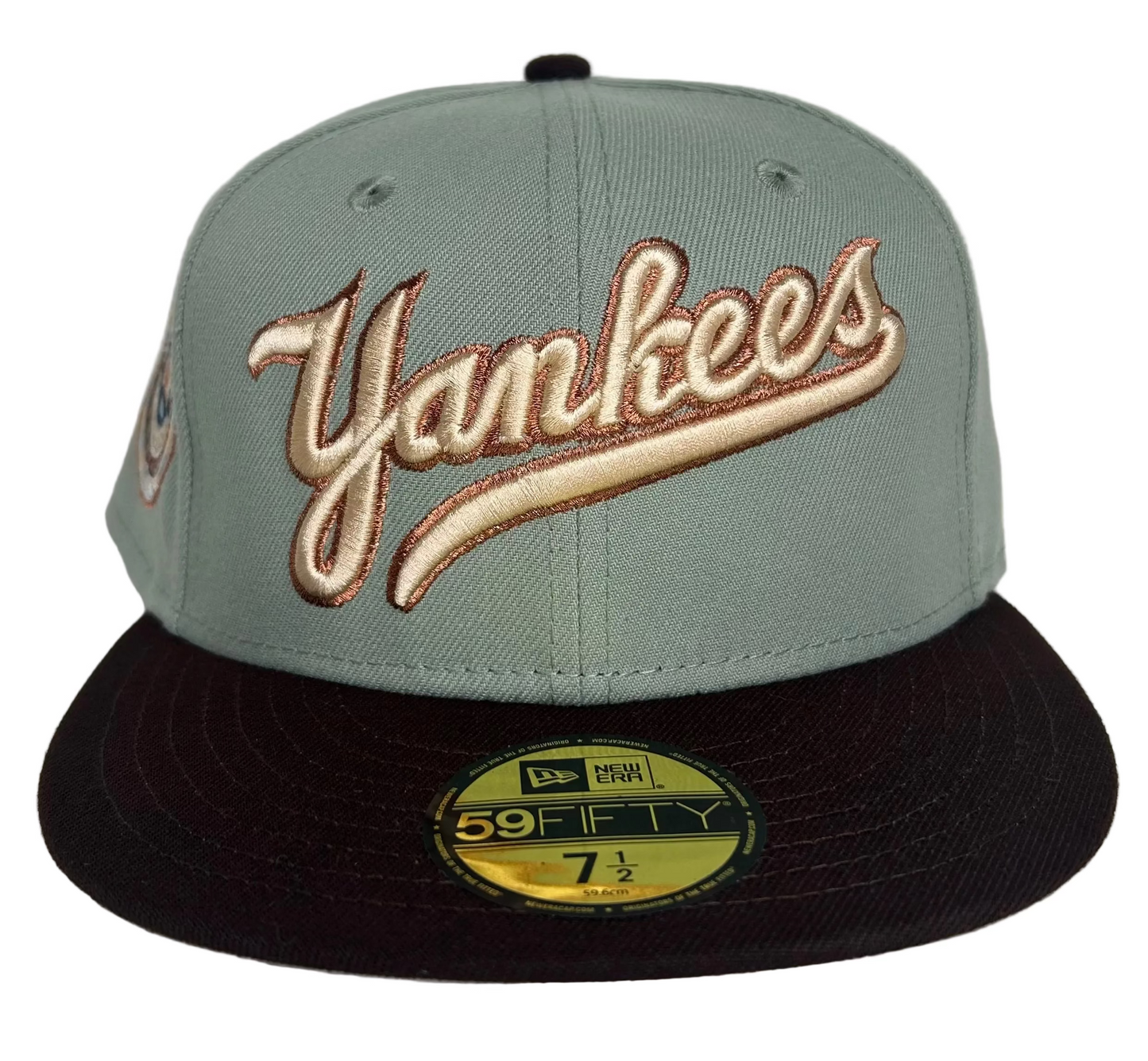 New Era New York Yankees 59FIFTY fitted Hat featuring a grey crown & a dark brown brim.