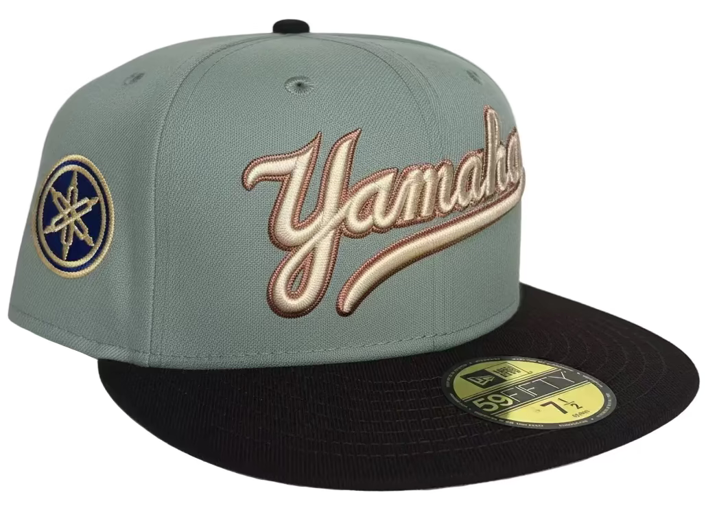 New Era New York Yankees 59FIFTY fitted Hat featuring a grey crown & a dark brown brim.