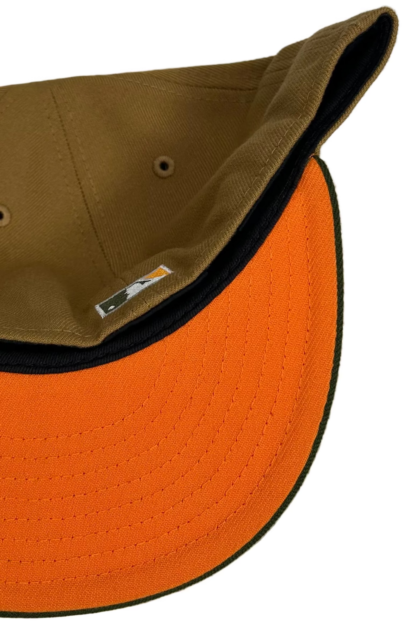 New Era Toronto Blue Jays 30th Season 59FIFTY fitted hat, specifically a custom two-tone model often referred to as "Copper Canyon.”