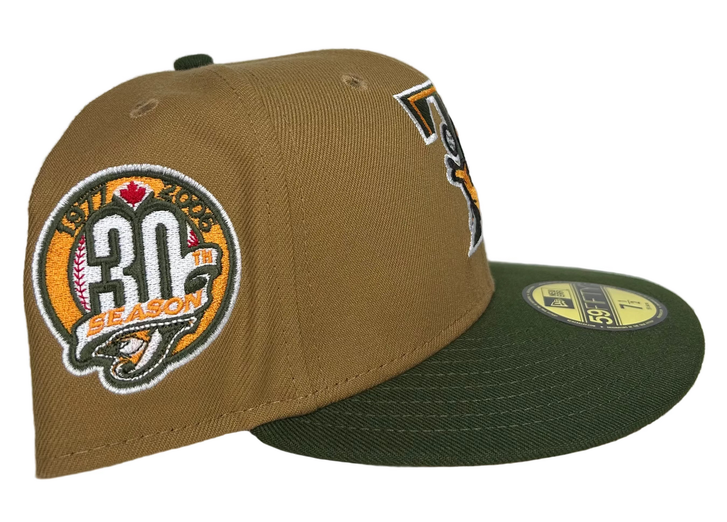 New Era Toronto Blue Jays 30th Season 59FIFTY fitted hat, specifically a custom two-tone model often referred to as "Copper Canyon.”