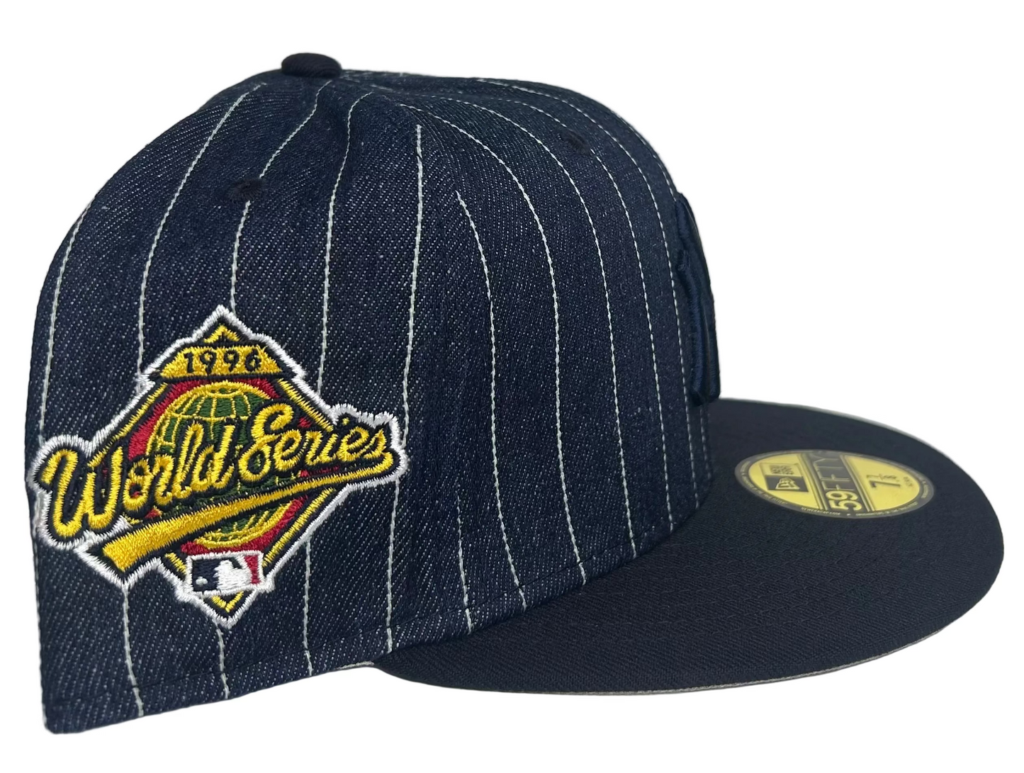New Era 59FIFTY New York Yankees 1996 World Series Patch Fitted Hat in navy pinstripe denim. 