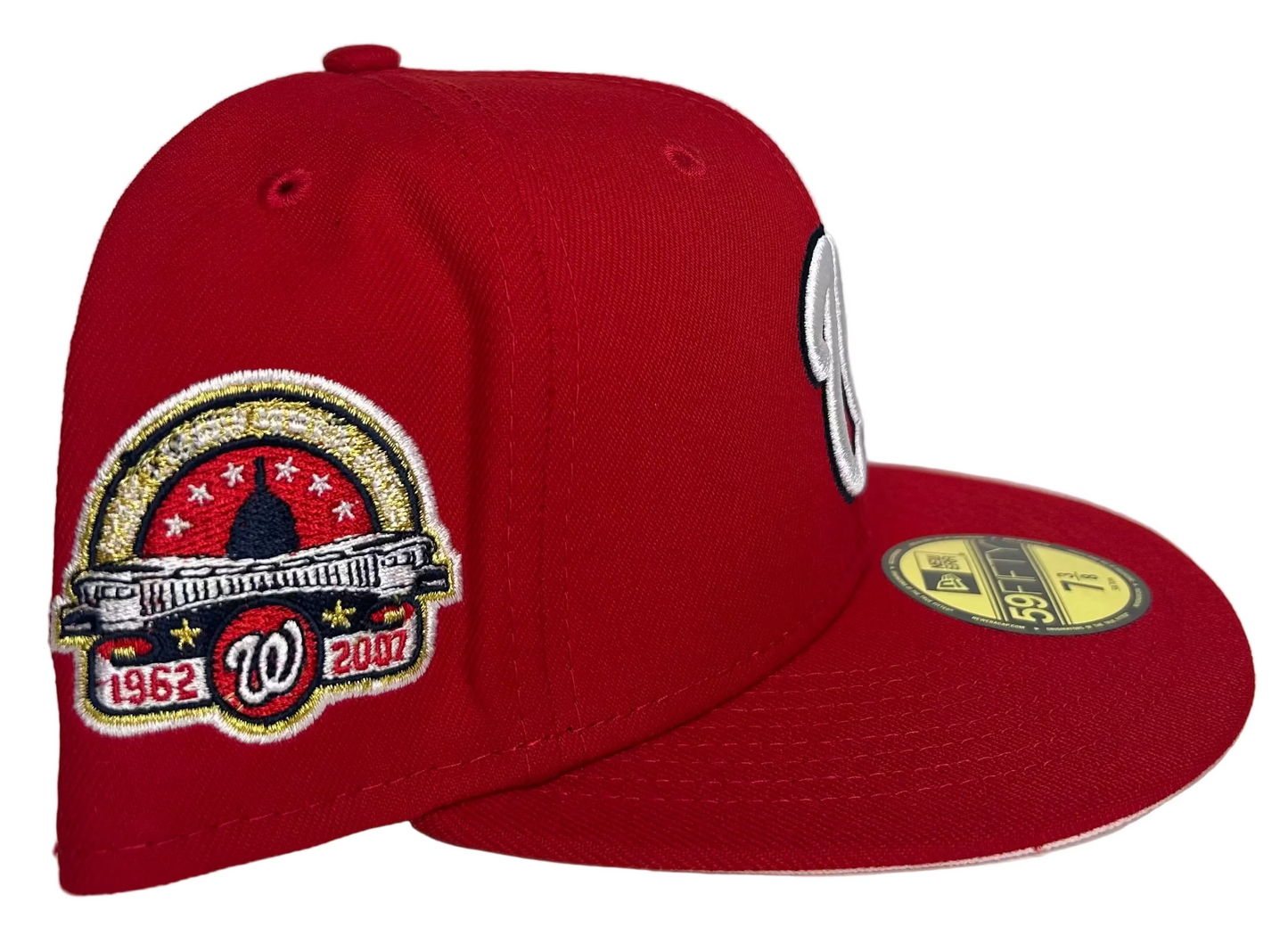 HC New Era Washington Nationals 59FIFTY fitted featuring a prominent commemorative side patch W/ Pink UV.