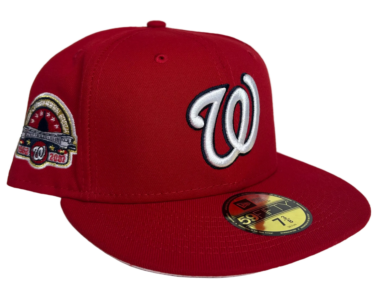 HC New Era Washington Nationals 59FIFTY fitted featuring a prominent commemorative side patch W/ Pink UV.