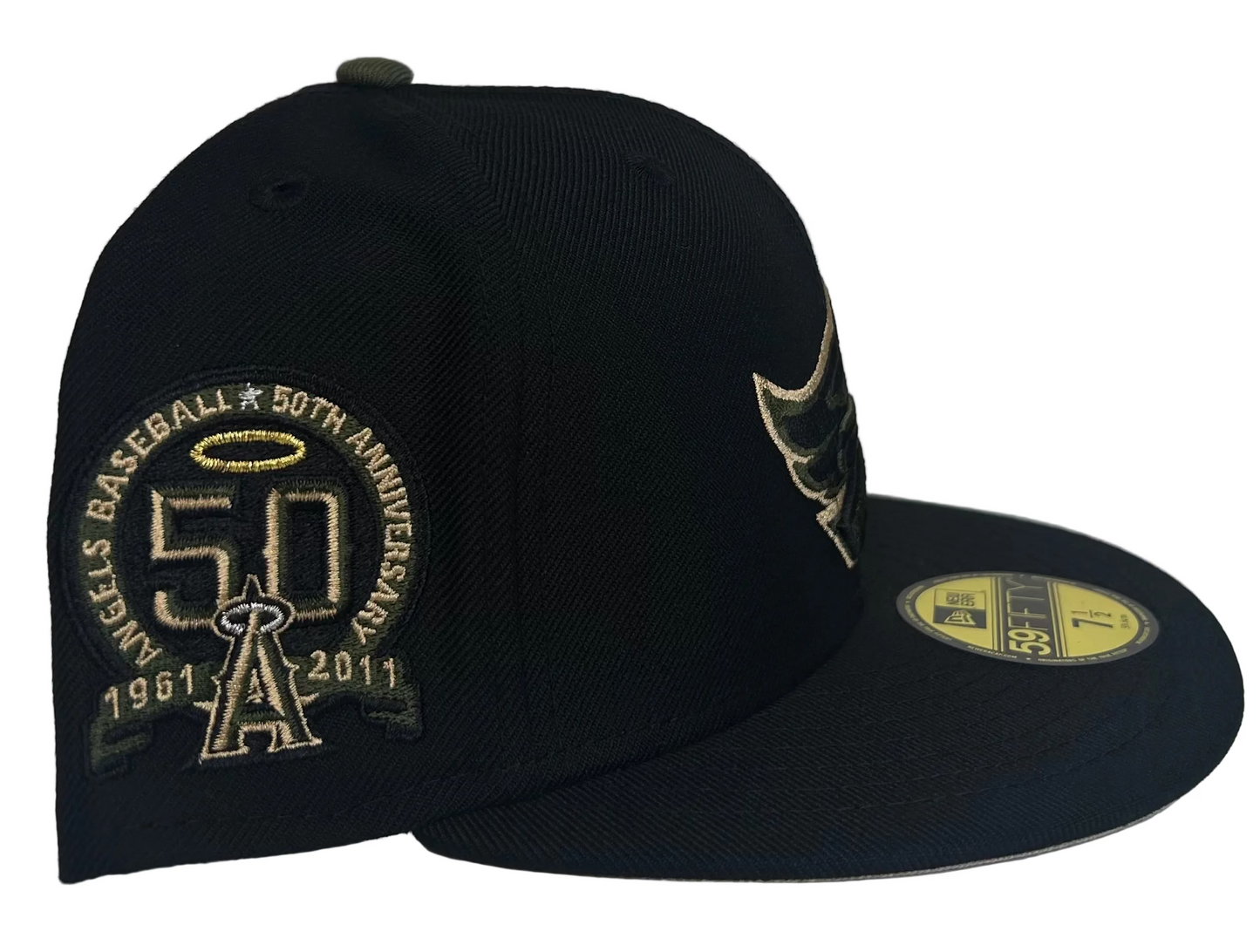 New Era Anaheim Angels 50th Anniversary 59FIFTY fitted cap, typically featuring a black crown and a unique side patch commemorating the team's history. 