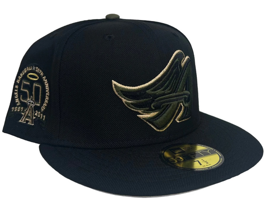 New Era Anaheim Angels 50th Anniversary 59FIFTY fitted cap, typically featuring a black crown and a unique side patch commemorating the team's history. 