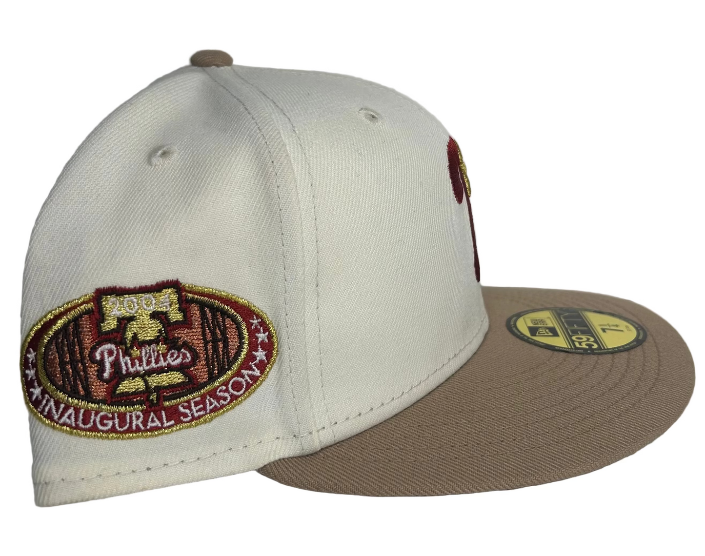 OFF-white Philadelphia Phillies 59FIFTY fitted hat featuring a tan visor, brown under-visor, and a 2004 Inaugural Season side patch. 