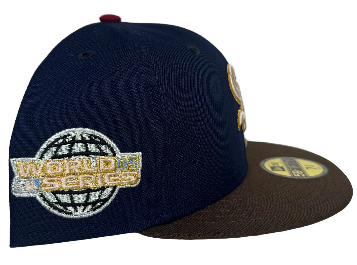 New Era Chicago White Sox 59FIFTY fitted hat with a navy blue crown, brown visor, and a gold World Series side patch.