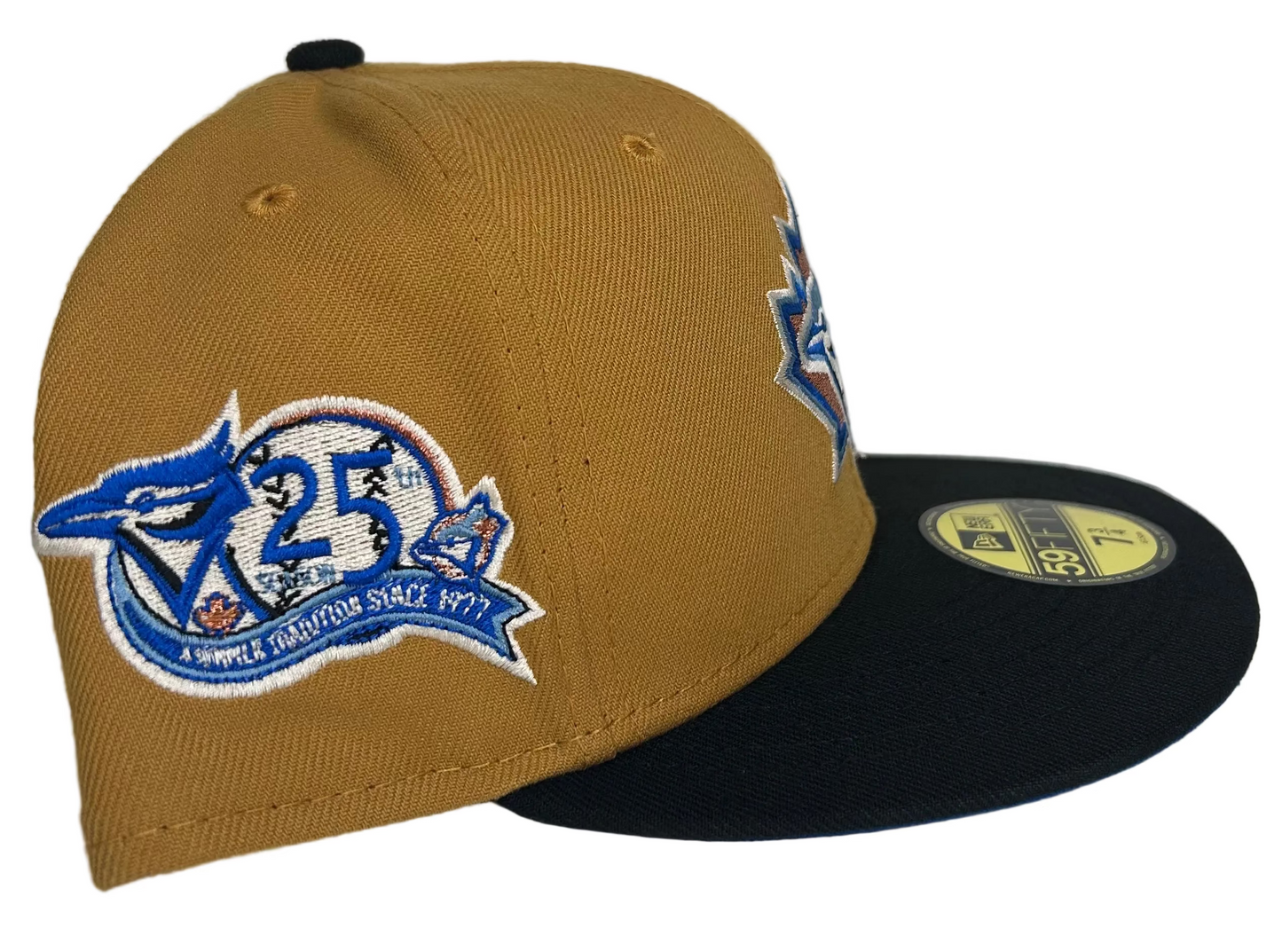 New Era Toronto Blue Jays "Ancient Egypt" 59FIFTY fitted hat with a tan crown, black visor, and a 25th anniversary side patch.