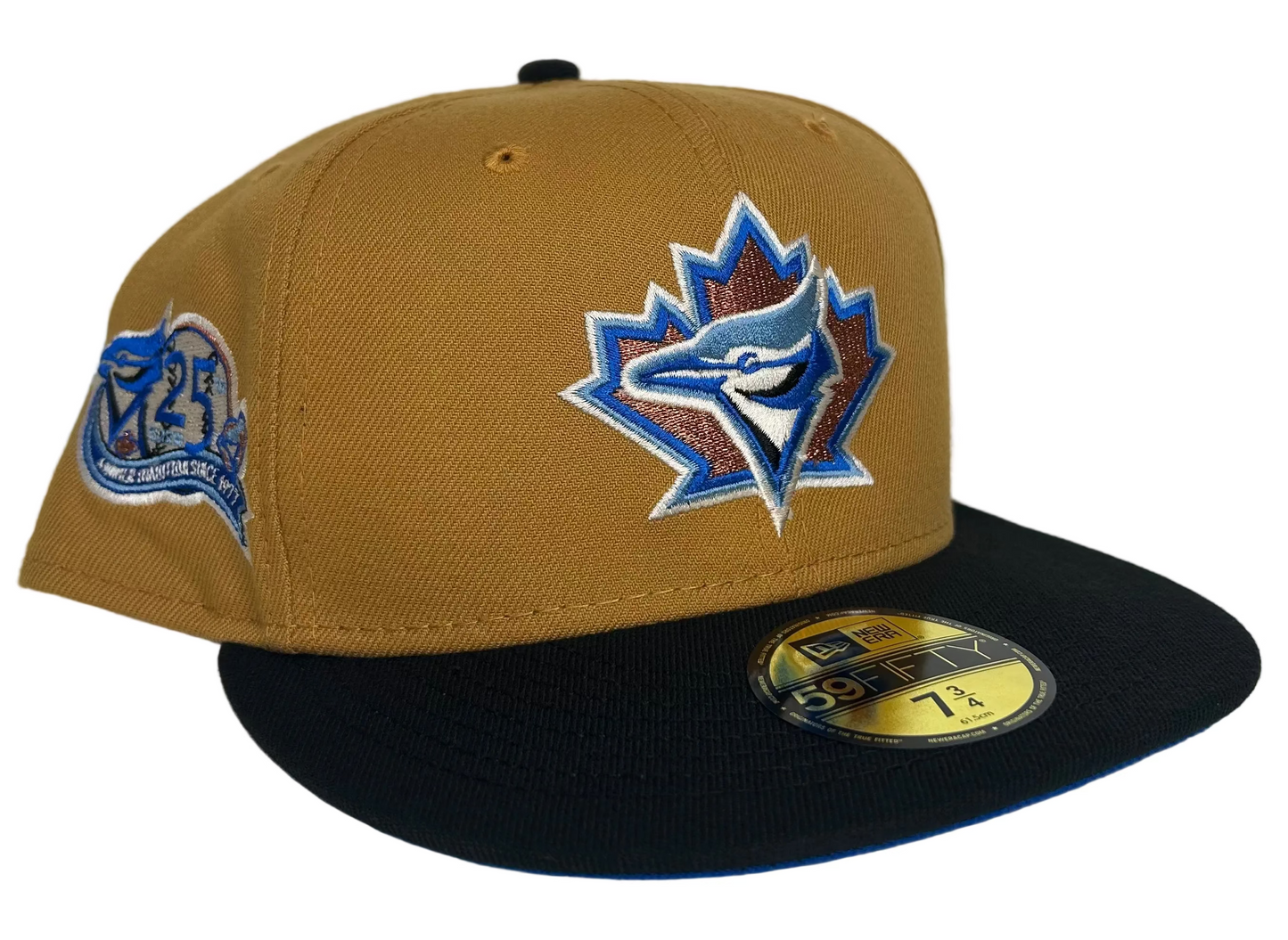 New Era Toronto Blue Jays "Ancient Egypt" 59FIFTY fitted hat with a tan crown, black visor, and a 25th anniversary side patch.