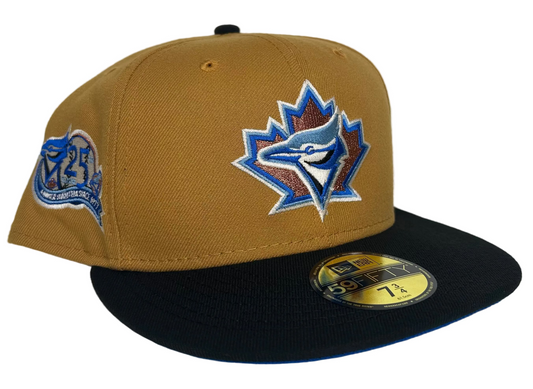 New Era Toronto Blue Jays "Ancient Egypt" 59FIFTY fitted hat with a tan crown, black visor, and a 25th anniversary side patch.