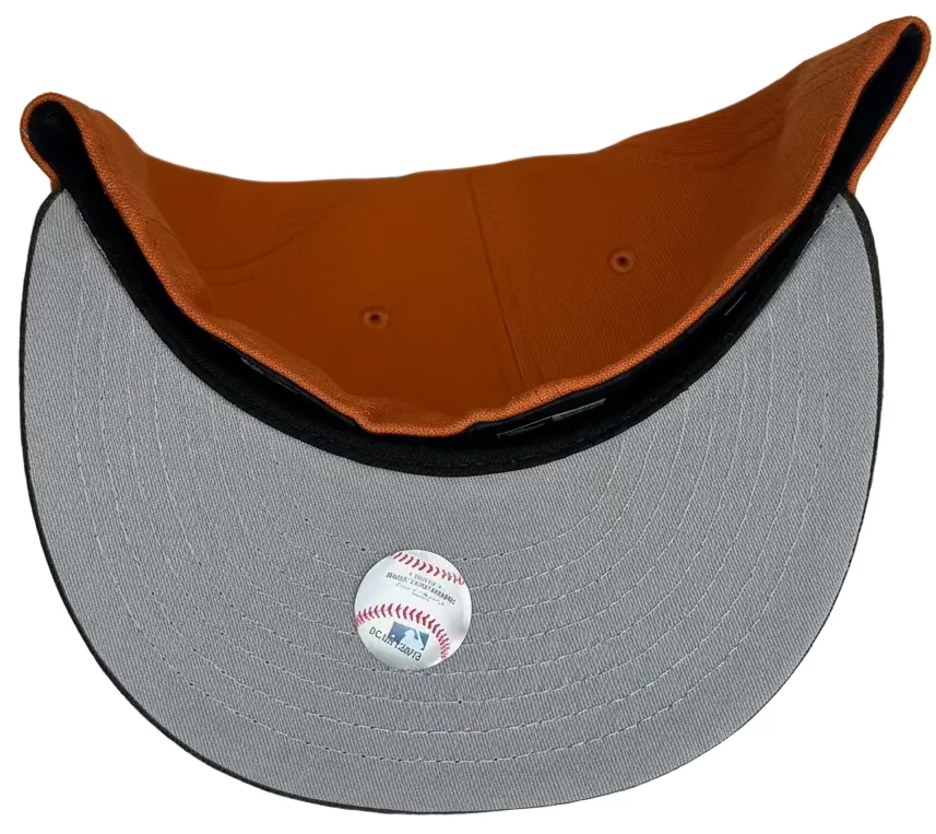 New Era Cleveland Indians 59FIFTY fitted hat with a brown visor and a specialized side patch commemorating the 1994 inaugural season at Jacobs Field.