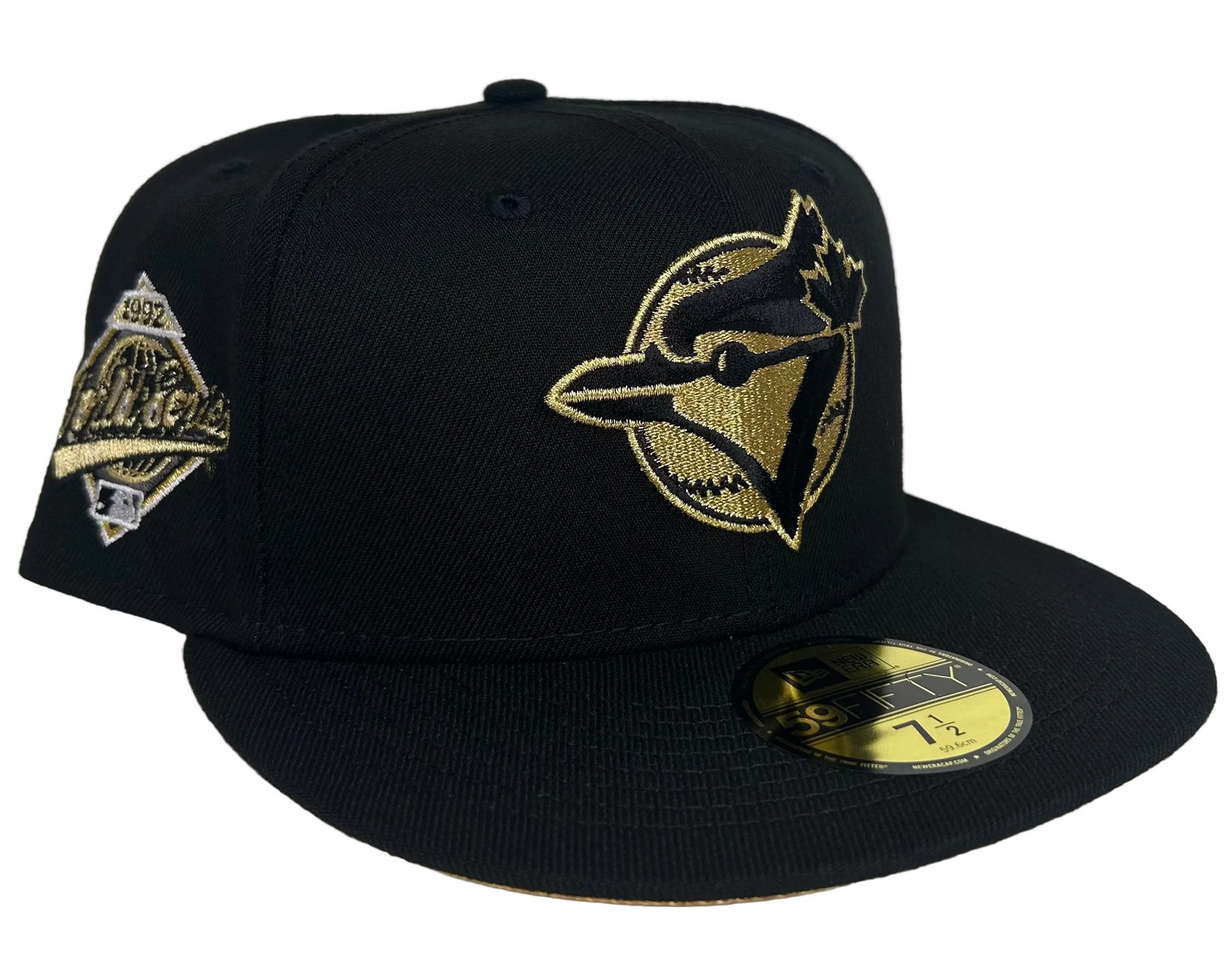New Era Toronto Blue Jays 59FIFTY fitted hat featuring a black crown and metallic gold embroidery