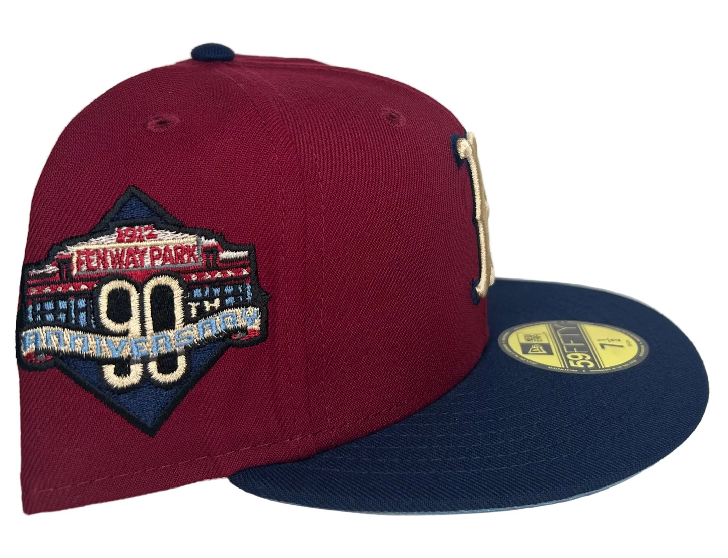 New Era Boston Red Sox State Fruit 59FIFTY fitted hat featuring a burgundy crown, navy visor, and a 90th anniversary patch.