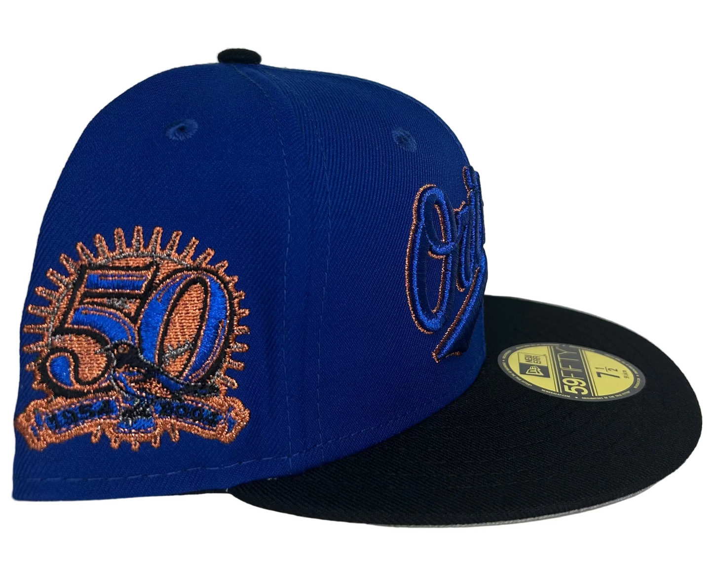 New Era Baltimore Orioles 59FIFTY fitted hat with a blue crown, black visor, and a special anniversary side patch.