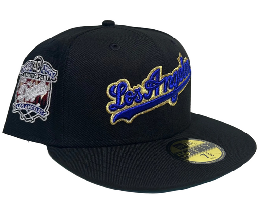 New Era Los Angeles Dodgers 59Fifty fitted cap featuring a black crown, royal blue and gold script lettering, and a commemorative side patch.