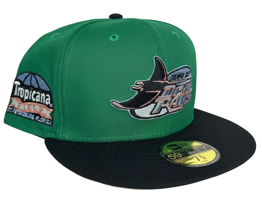 New Era Tampa Bay Rays 59FIFTY fitted hat featuring a green crown, black visor, and a Tropicana Field side patch.