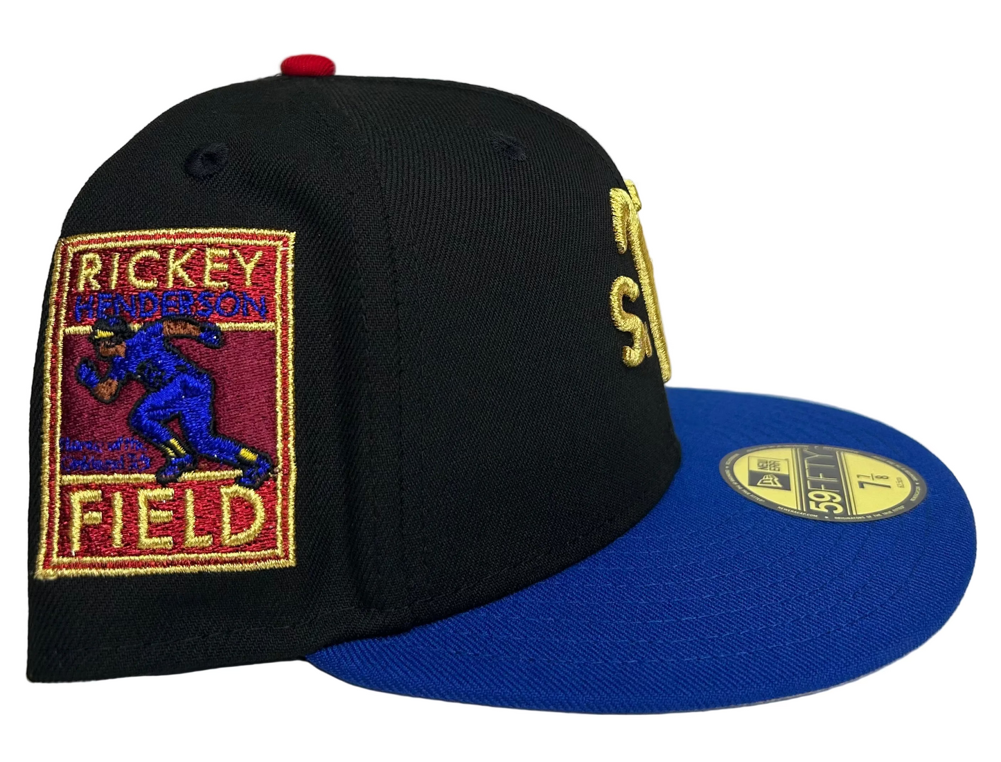 New Era Oakland Athletics 59FIFTY fitted cap featuring a black crown, royal blue visor, and an upside-down yellow embroidered logo.