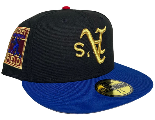 New Era Oakland Athletics 59FIFTY fitted cap featuring a black crown, royal blue visor, and an upside-down yellow embroidered logo.