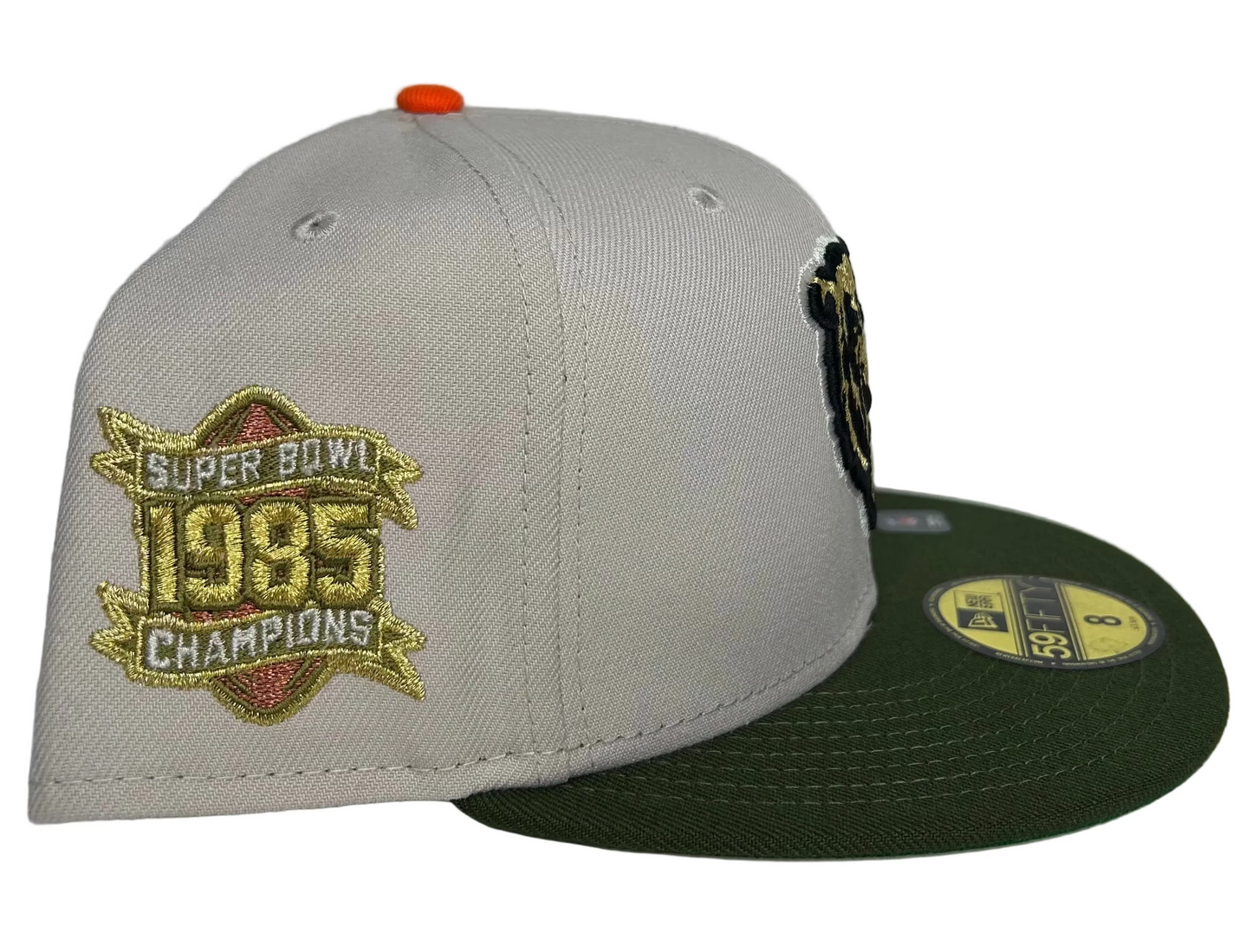 New Era Chicago Bears 59FIFTY fitted hat with a tan crown, green brim, and a "Super Bowl 1985 Champions" patch on the side.