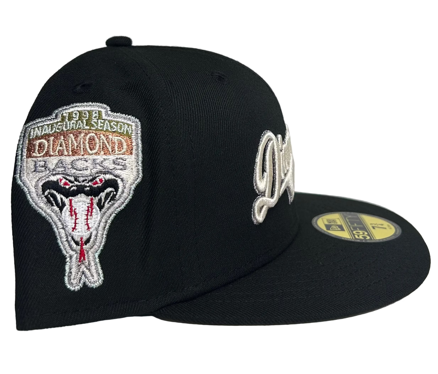 New Era 59FIFTY Arizona Diamondbacks fitted hat in black featuring a "Diamondbacks" script logo on the front and a commemorative side patch.